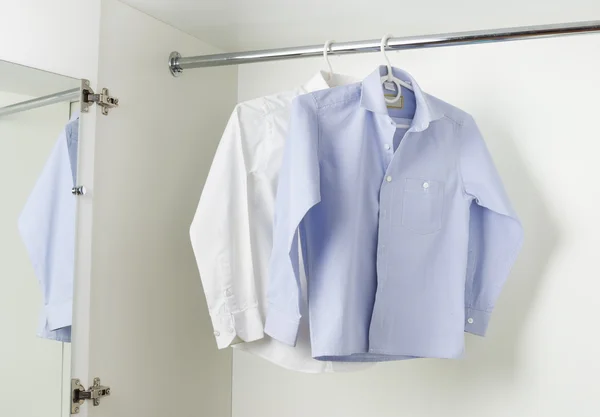 Clean shirts in the closet — Stockfoto