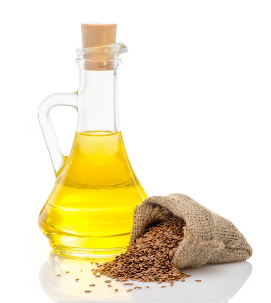 Linseed oil and flax seeds — Stock Photo, Image