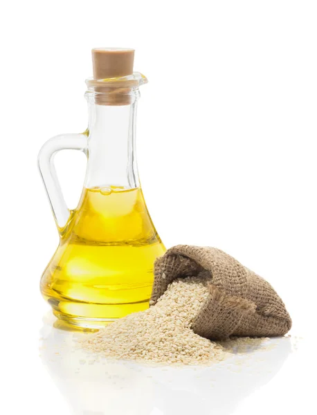 Sesame oil and sesame — Stock Photo, Image