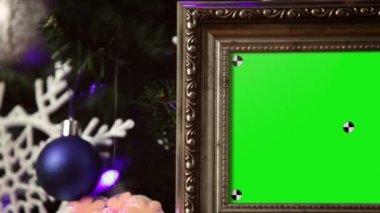 Zarif fotoğraf çerçeveleri Noel ağacı üzerinde