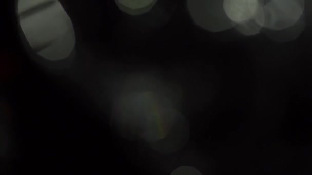 Vazamentos de luz no fundo preto — Vídeo de Stock