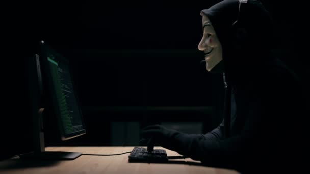 Masked Hacker Typing — Stock Video