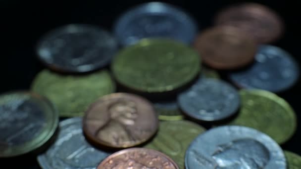 Coins on black background — Stock Video