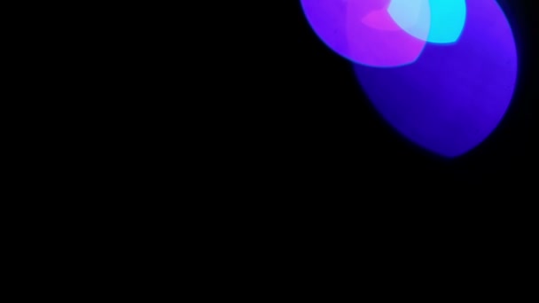 Lumières colorées bokeh sur noir 