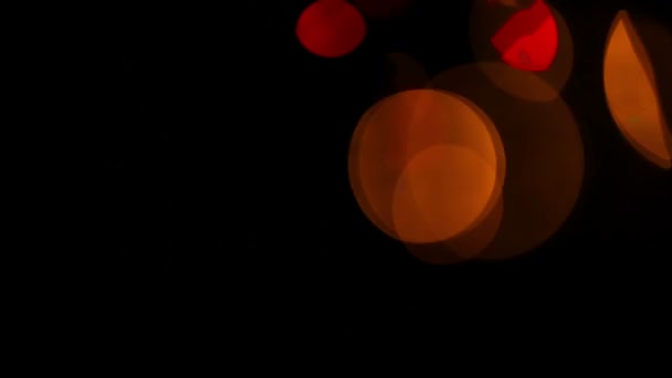 Lumières colorées bokeh sur noir 