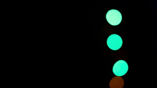 Farbige Lichter Bokeh auf Schwarz — Stockvideo