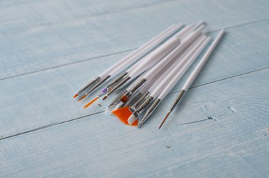 tırnak Sanat fırçalar hafif ahşap arka plan ayarla