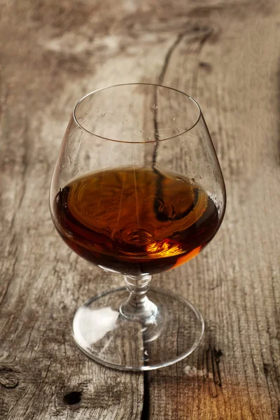 Brandy in large round glass — Stock Photo, Image