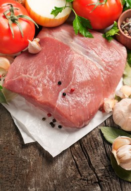 raw pork shoulder with vegetables clipart