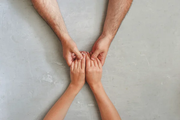 Loving couple holding hands — Stock Photo, Image