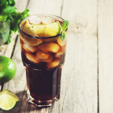 Cocktail with cola and ice