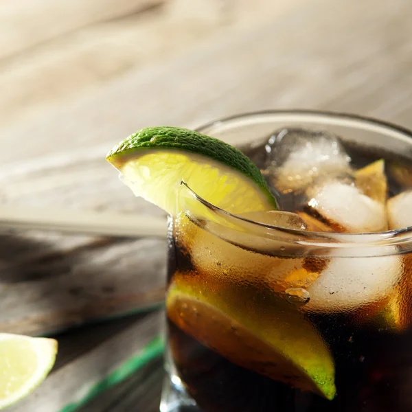 Cocktail with cola and ice — Stok fotoğraf