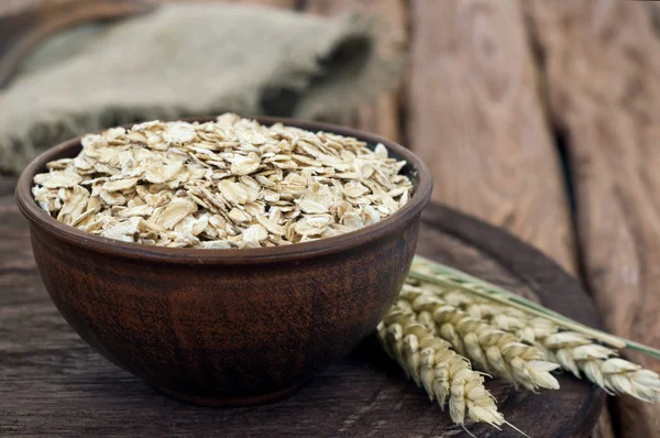 Full a bowl of oatmeal — Stock Photo, Image