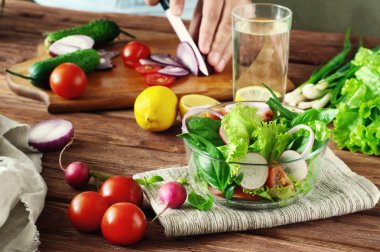 salad of vegetables in a deep bowl of glass