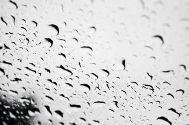 Water droplets on glass closeup