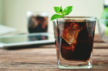 glass of cola poured to the brim clipart