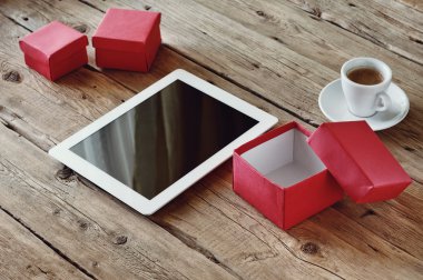 Gifts with a white tablet computer