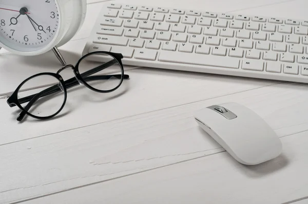 white keyboard, computer mouse and stylish glasses