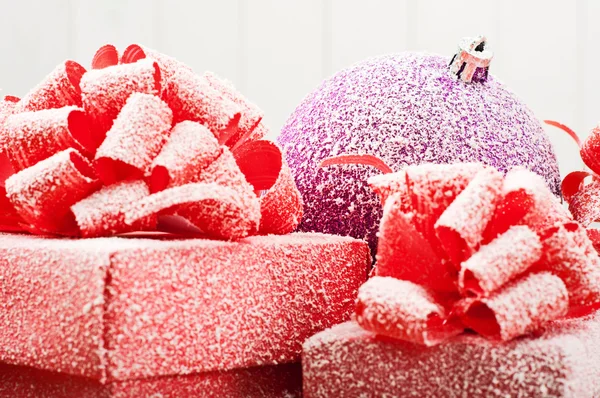 Christmas toys surrounded by Christmas presents — Stock Photo, Image