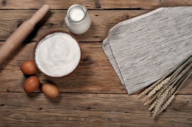 Baking ingredients (milk, eggs, flour)