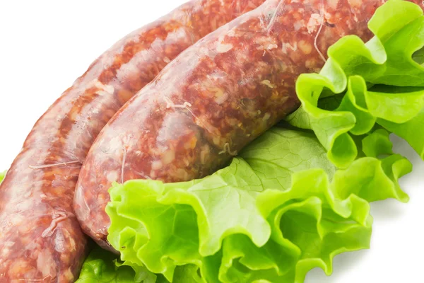 Beef sausage with greens — Stock Photo, Image