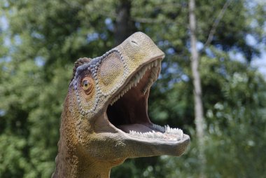 Dinozor kafası arka plan ağaç üzerinde