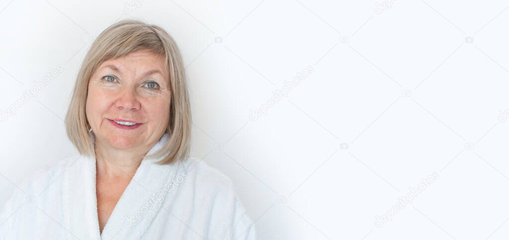 Cute smiling senior woman Anti age concept. Mature woman face after spa treatment. Old age in joy, about seniority, healthcare, cosmetology, pensioner and mature people, new senior. Copyspase. Banner