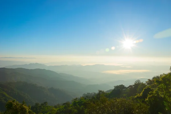 Landscape mountain Sunrise with foggy Stock Image