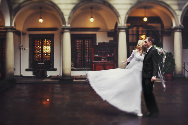 Romantic newlywed couple posing