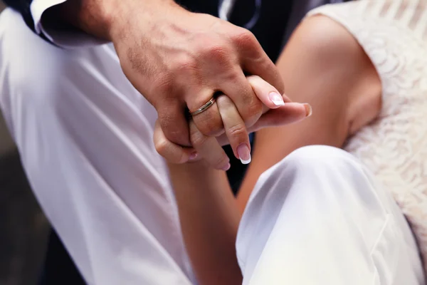 Bride holding hands — Stock Photo, Image