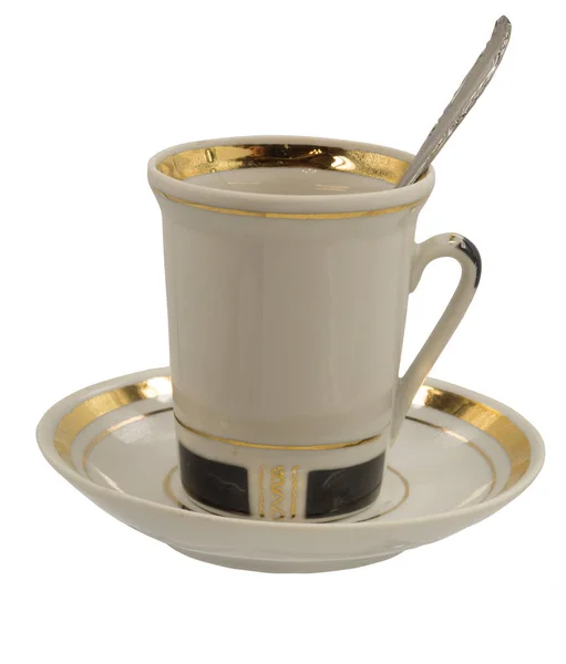 ソーサーにスプーン付きのヴィンテージコーヒーカップ — ストック写真