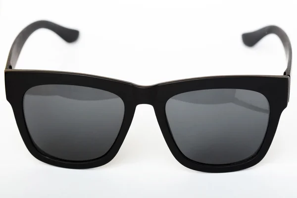 Svart solglasögon på en vit bakgrund — Stockfoto