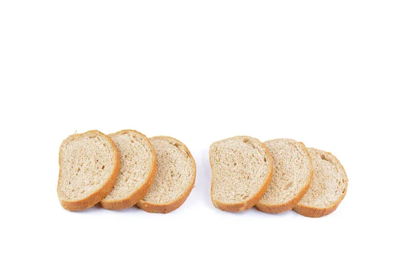 Świeżo upieczony z ziarna chleba na białym tle — Zdjęcie stockowe