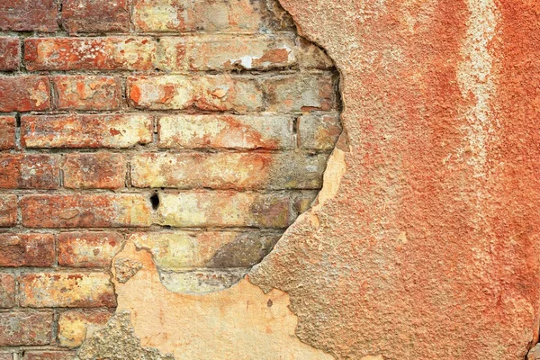 Старый потрескавшийся бетон со штукатуркой из кирпичной стены, текстура терракотовый узор — стоковое фото