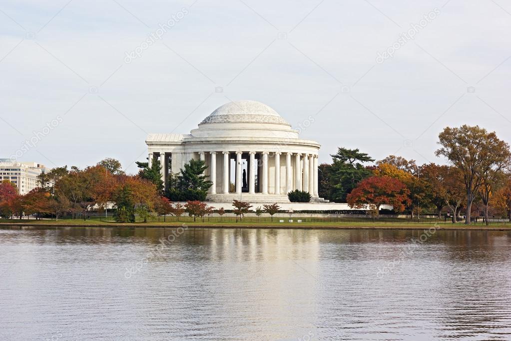 Autumn colored trees around Thomas Jefferson Memorial and Tidal Basin in Washington DC, USA.