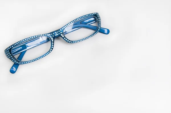 Niebieski okulary do czytania, iskierka — Zdjęcie stockowe