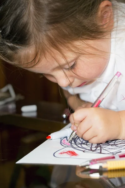 Little girl drawing with markers Royalty Free Stock Images