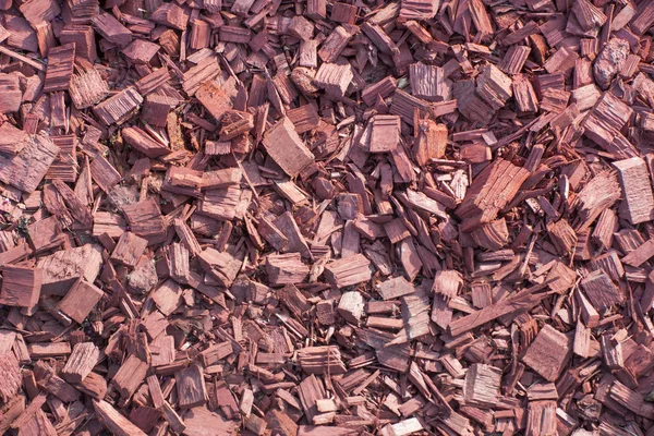 Sfondo da piccoli pezzi di legno rosso — Foto Stock