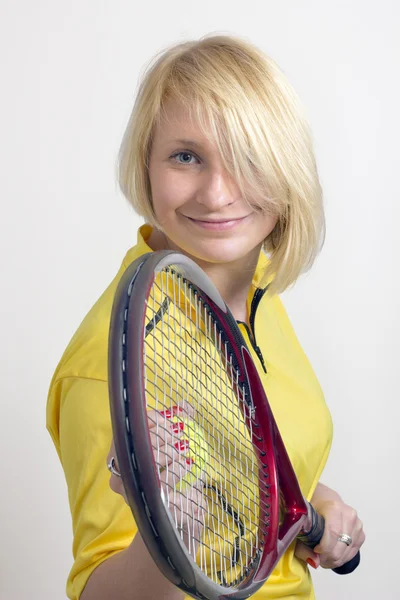 Woman with a tennis racket — Stock Photo, Image