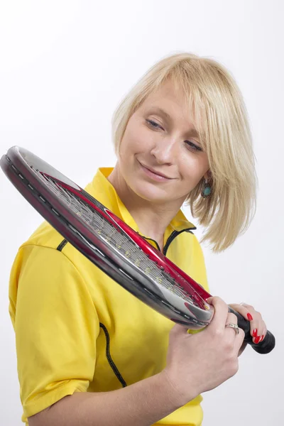 Woman with a tennis racket — Stock Photo, Image