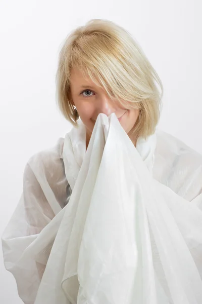 Young woman with a white cloth — Stock Photo, Image