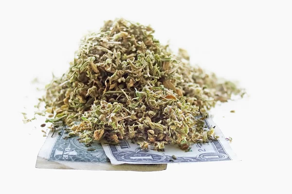 Konopie suszonych liści i nasion na jeden Dolar banknotów — Zdjęcie stockowe