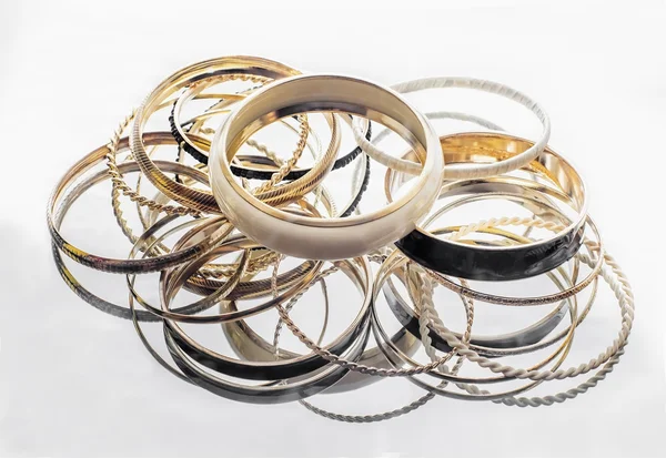 Lot of golden bracelets — Stock Photo, Image