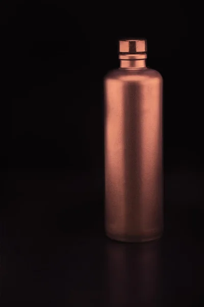 Bronze colored ceramic bottle — Stock Photo, Image