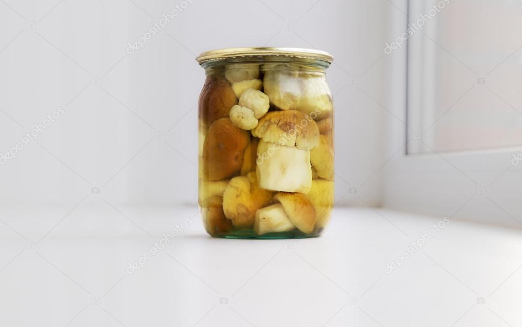 Boletus mushrooms in a glass jar