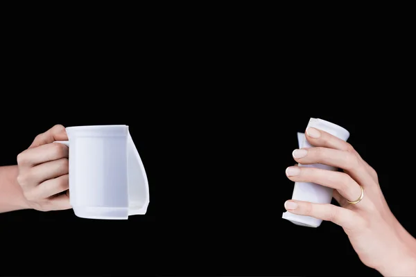 Woman's hands holding a broken white mug — Stock Photo, Image