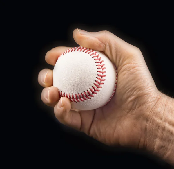 Mão de homem com uma bola de beisebol — Fotografia de Stock