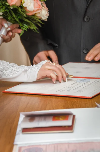 signature of the bride in a wedding book