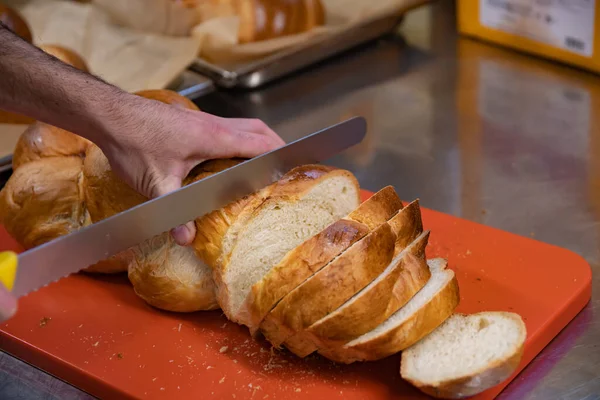 Man Cutting Slicing Loft Fresh Swiss Zopf Braided Bread Serrated — Stock Photo, Image