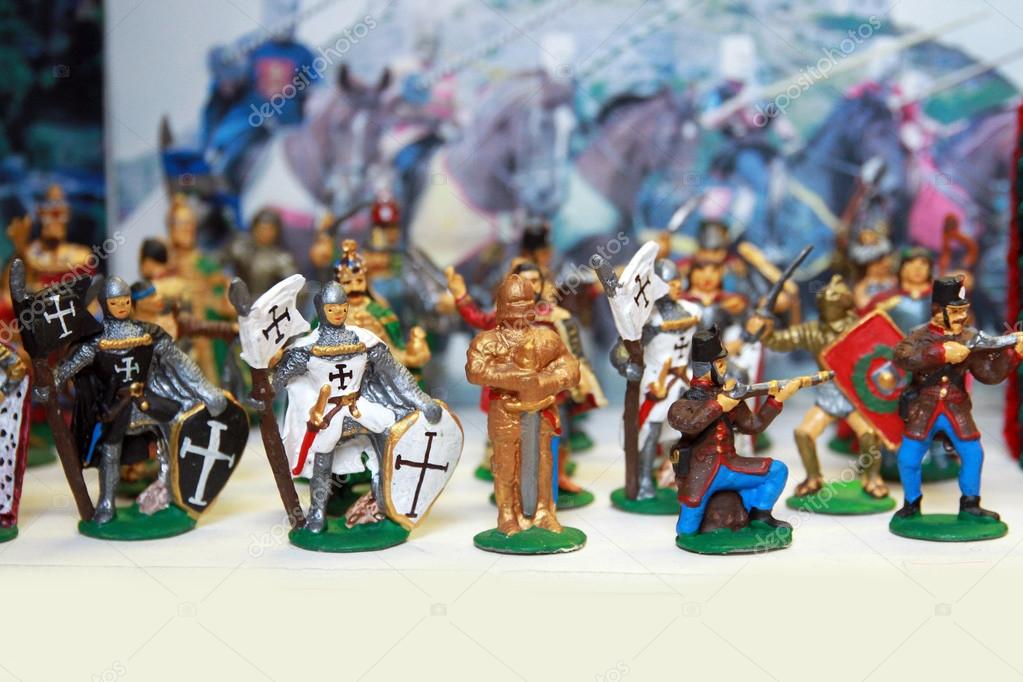Colorful medieval toy soldiers in a row
